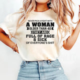 Never Pick A Fight With A Woman Older Than 40 T-Shirt